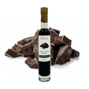bottle of balsamic in front of dark chocolate chunks