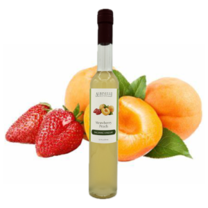 Strawberries and peaches behind a bottle of balsamic