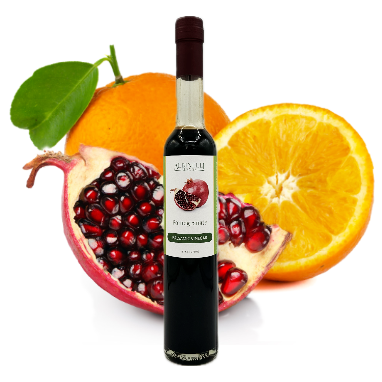 balsamic in front of open pomegranate and sliced orange